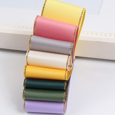 2.5cm Poliéster de oro de borde doble cara cinta de grano grueso para árbol de Navidad y bolsas