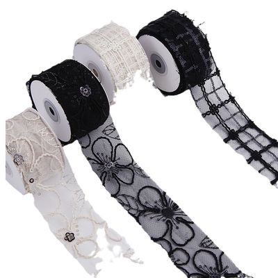 Cinturón de malla de poliéster brillante de 50 mm con cinta de jacquard floral