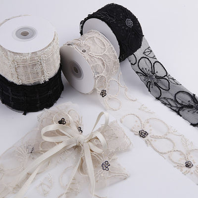 Cinturón de malla de poliéster brillante de 50 mm con cinta de jacquard floral