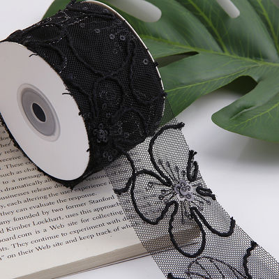 Cinturón de malla de poliéster brillante de 50 mm con cinta de jacquard floral