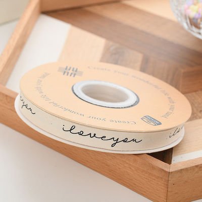 13mm Logotipo mayorista cinta de algodón estilo literario Flor de embalaje caja de regalo Decoración cinta de pastel ramo